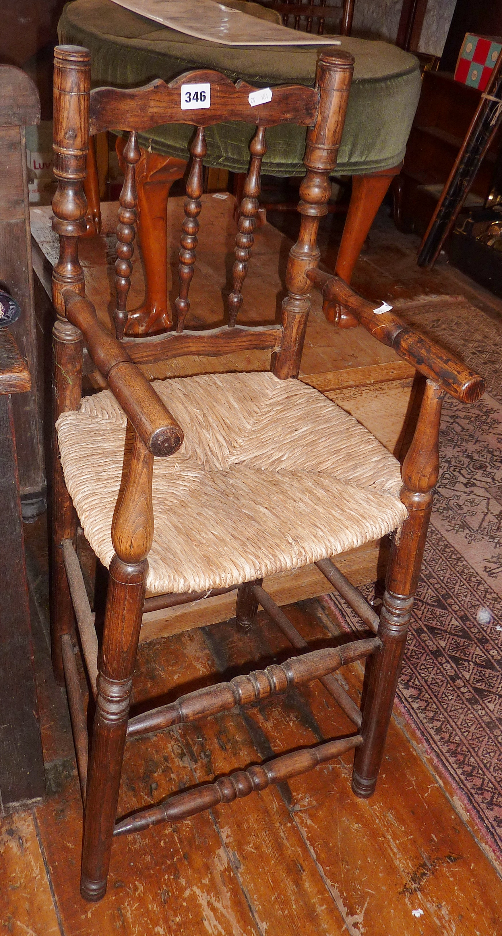 Rustic oak child's ladderback highchair with rush seat