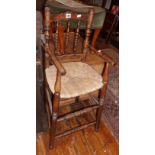 Rustic oak child's ladderback highchair with rush seat