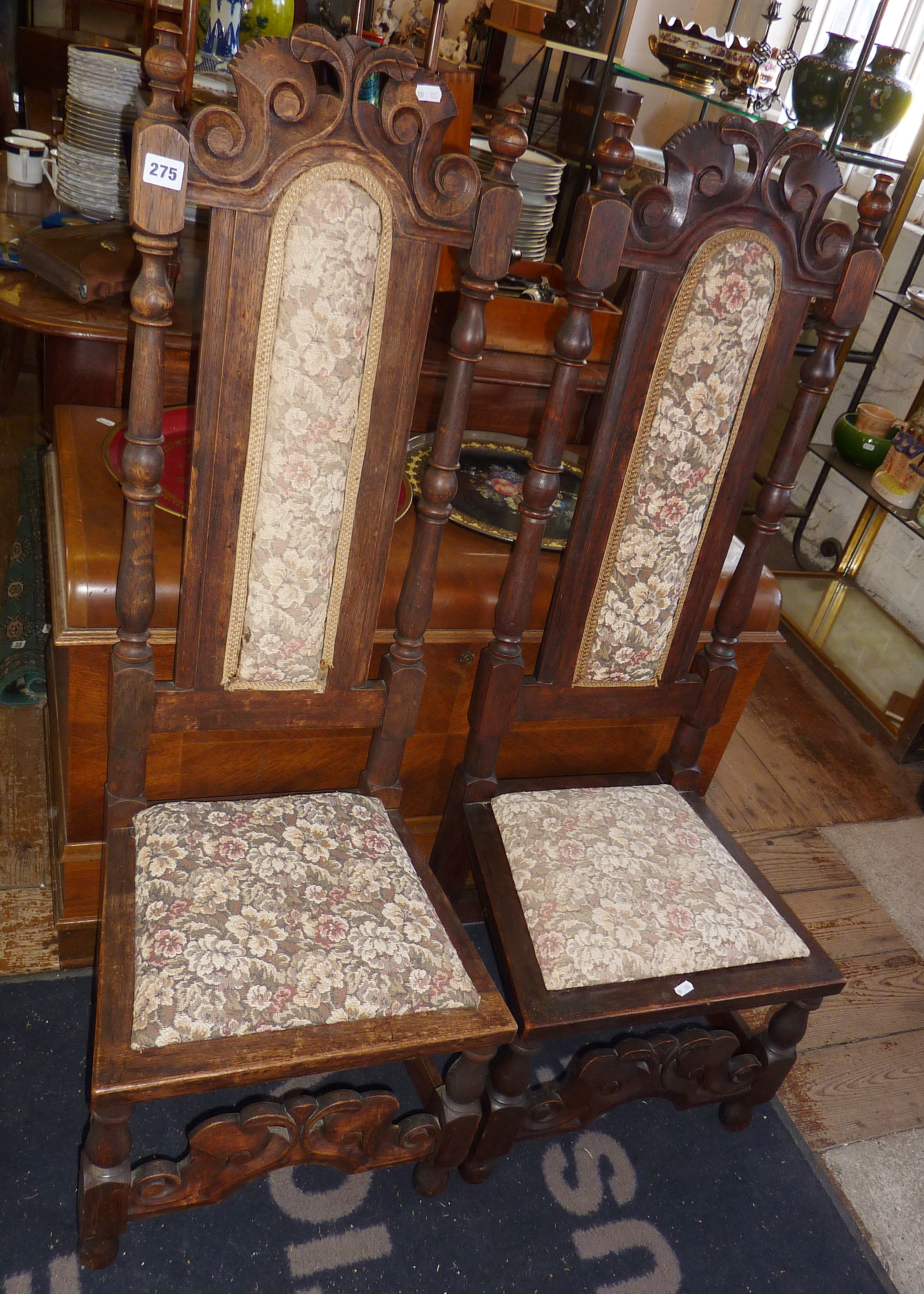 Pair of 19th century carved oak Jacobean Revival side chairs, with upholstered seats and back