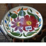 Two hand painted floral Wade plates