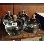 Four Modernist Scandinavian type glass bubble globe lamp bases with polished pontils under