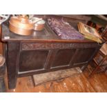 18th century oak coffer with carved frieze above three panels