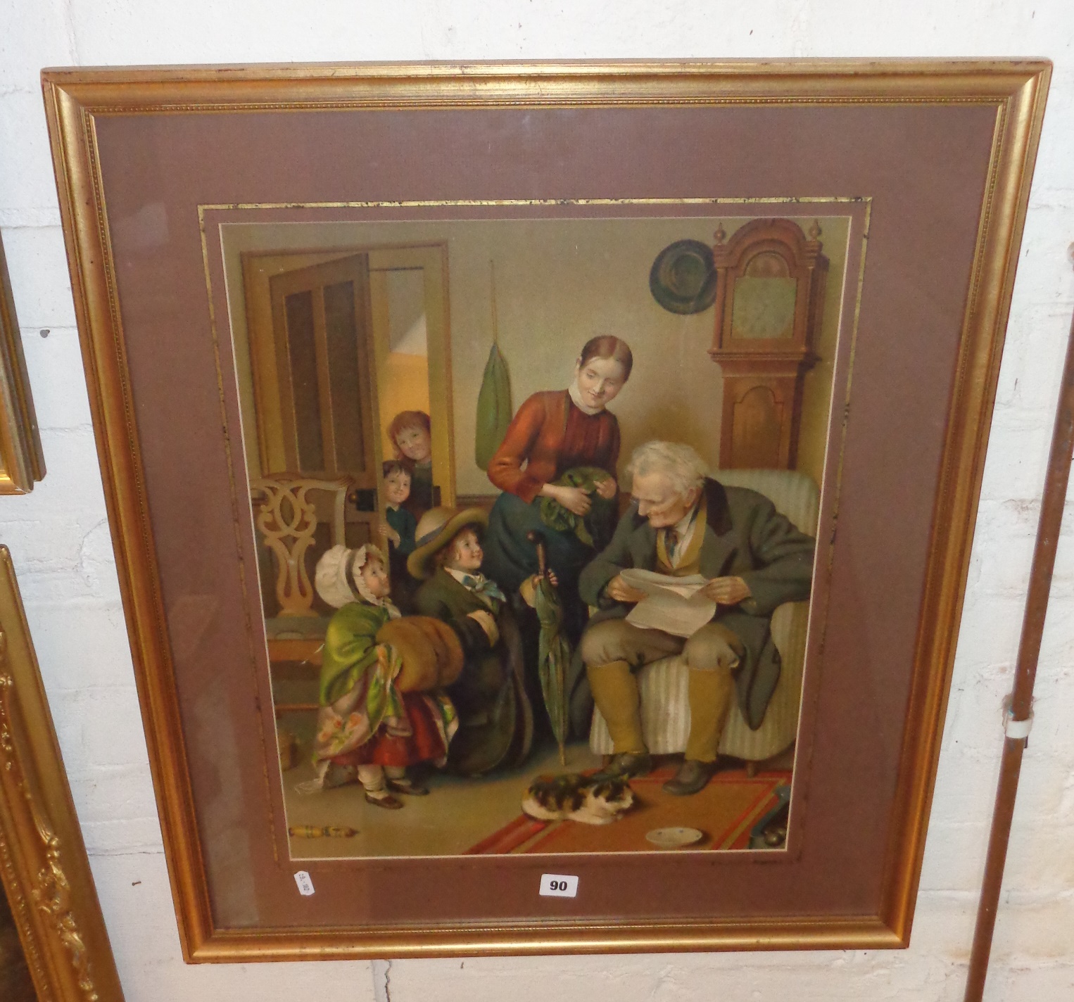 Framed Victorian coloured print of an interior family scene, titled verso 'Unexpected Visitor'