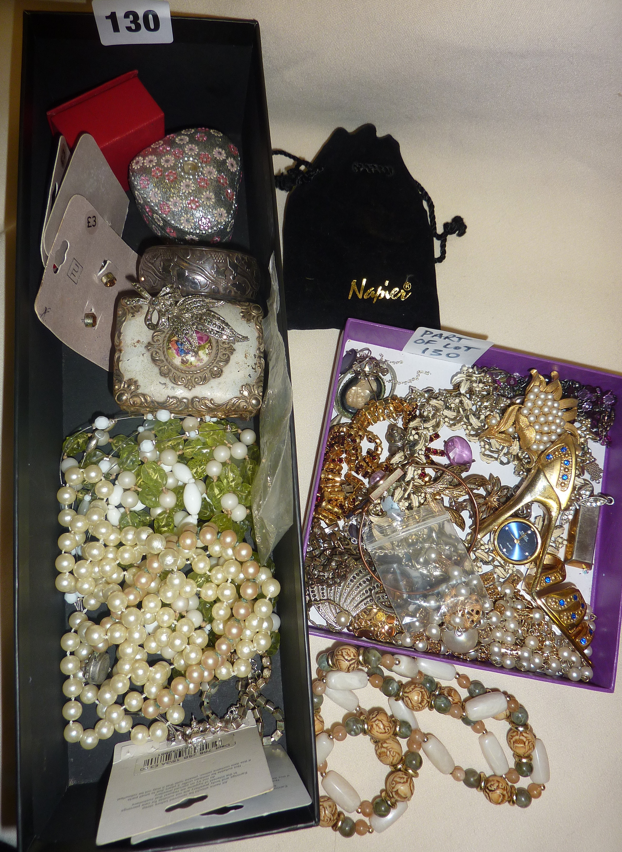 Two boxes of assorted vintage costume jewellery, small silver bangle, and a 1930's leather clutch