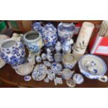 Large collection of blue and white china including modern Chinese and Delft vases and ornaments