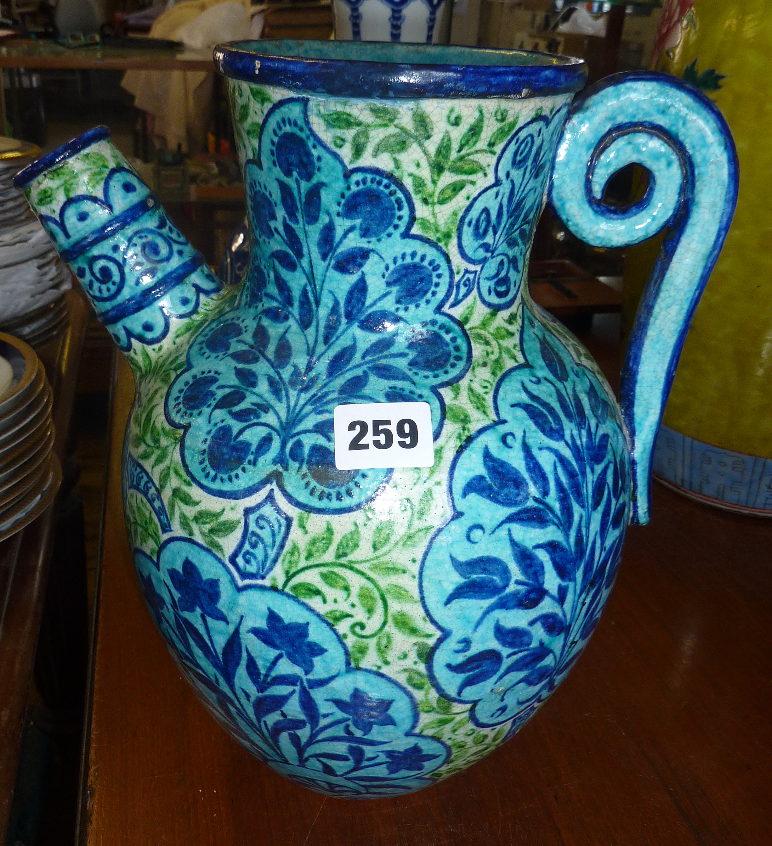 19th century 'Persian' pattern thrown pottery ewer,possibly by William de Morgan