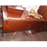 Early 19th century crossbanded Pembroke table, with two frieze drawers, on turned centre column