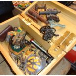 Box containing assorted die-cast models of cannons, AA car badge, Olympic medallions etc