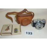 Mycro Una vintage miniature camera in leather case with film roll