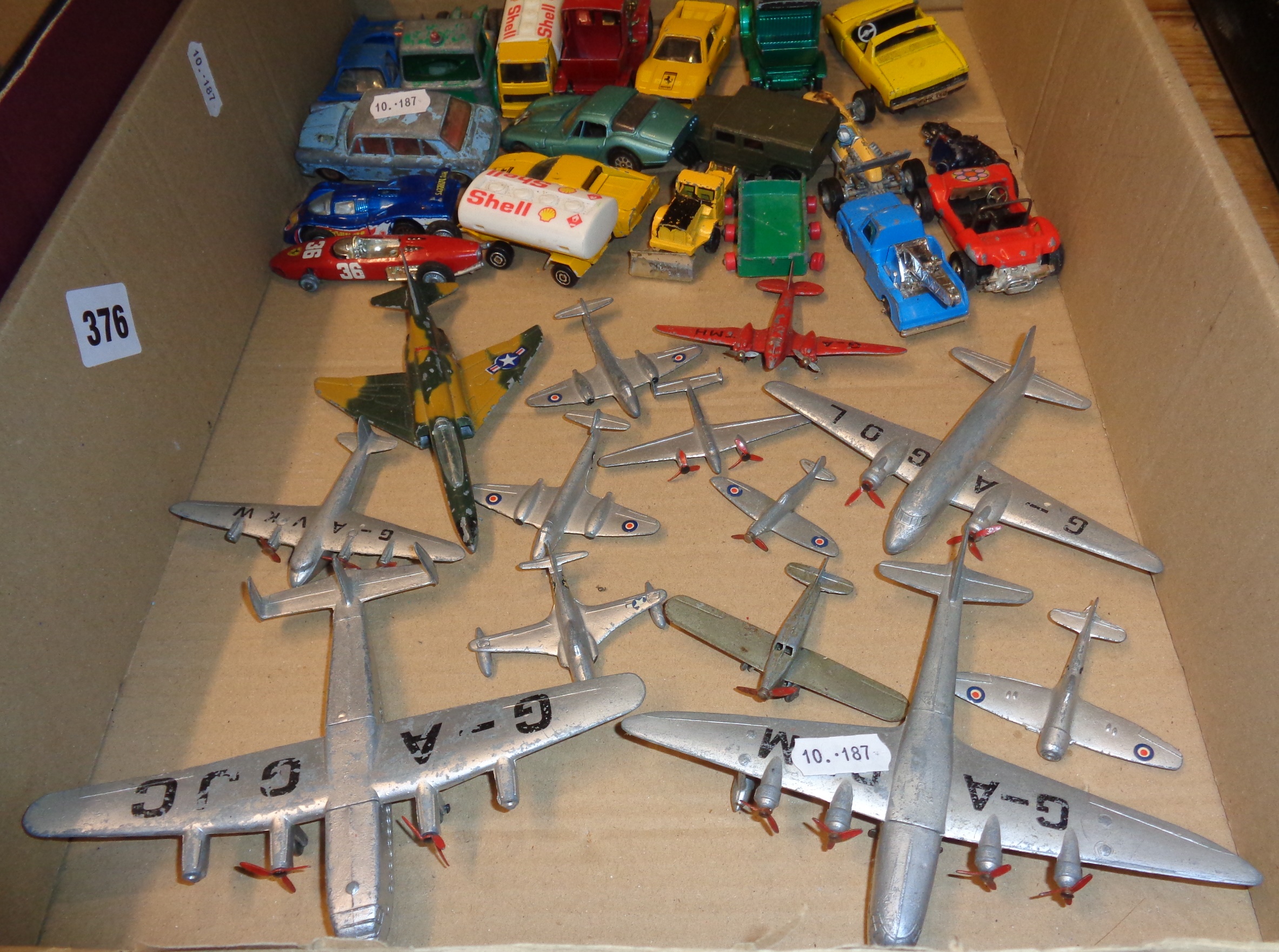 Box containing Dinky Toys and Corgi die-cast vehicles and aeroplanes along with other manufacturers