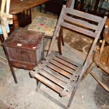 Small mahogany sewing table and a slatted wood folding garden chair