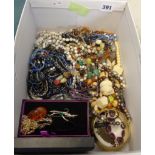 Box of costume jewellery including an amber pendant