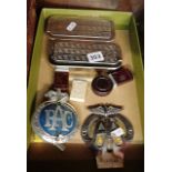 Two vintage Rolls Razors in cases, with accessories, an AA and RAC classic car grille badges, etc.