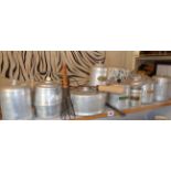 1940's aluminium storage jars (8) including an early Cadbury Bourneville wooden handled whisk