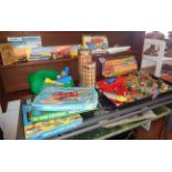 Large collection of games including Scalex, clockwork motor yacht, Octopus student's microscope,