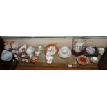Shelf of miniature floral china items including Limoges, Chinese vases etc
