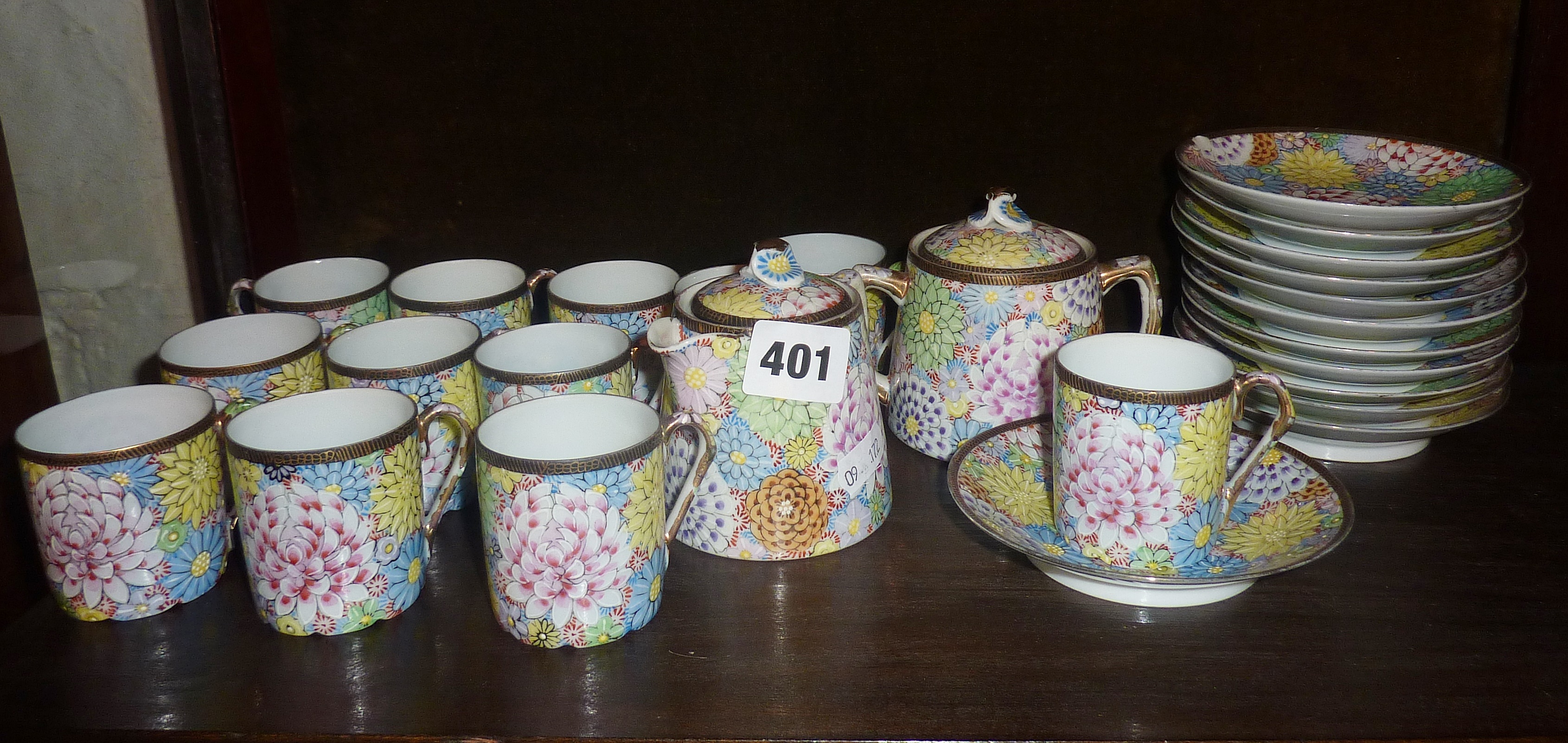 Japanese eggshell porcelain tea set in the "Thousand Flowers" pattern (12 cups and saucers, some A/