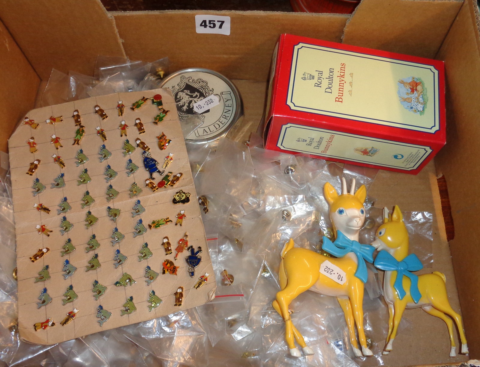 Two Babycham Bambi figures and a large quantity of enamel police charity Rupert the Bear and Friends