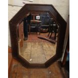 Oak framed lozenge-shaped wall mirror