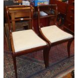 Pair of 'Regency mahogany sabre leg dining chairs with rope-twist top rail