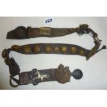 Old leather Scouts belt with Scout badges and WW1 military badges and buttons
