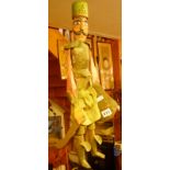 Vintage French painted wooden soldier puppet, holding a sword and shield