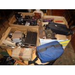 Large quantity in seven boxes of camera parts, lenses and cases etc