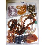 Assorted vintage beaded necklaces, including amber, tiger's-eye etc