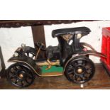 Vintage metal car model made from an antique Singer sewing machine