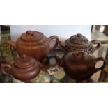 Four Chinese Yixing teapots, one with Squirrel decoration and handle, all marked