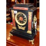 Victorian marble mantle clock by Maple & Co with ormolu mounts and black dial and gilt Roman
