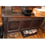 18th century oak coffer with carved frieze above three panels