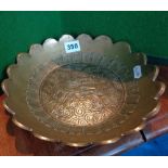 Chinese bronze bowl with incised dragon decoration and marks to base, 25cms in diameter