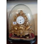 French ormolu mantle clock under glass dome