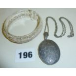 Silver coloured metal filigree bracelet (marked TORRES), and a large engraved silver? locket on