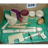 Antique 19th c carved ivory sewing accessories, pincushion clamps, tape measures, needle cases etc