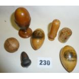 Treen sewing accessories, egg-shaped thimble holders and acorn-shaped needle holders etc., some