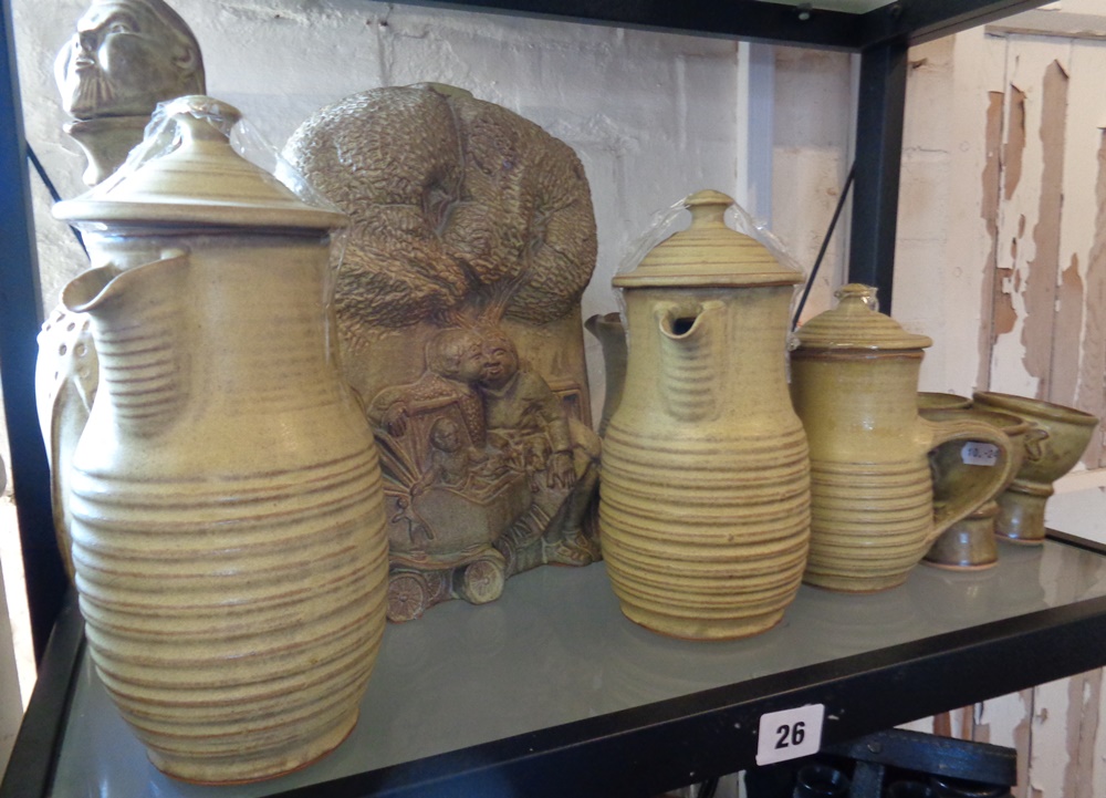 Studio Pottery: Twelve pieces of Charmouth Pottery including 'Monk' wine jug, three lidded jugs