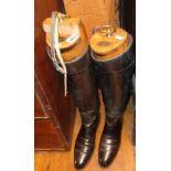 Pair riding boots and trees with makers label and brass rings (approx size 6)