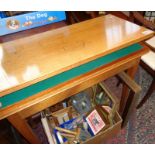 Late Victorian light oak fold over card table