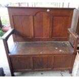 Edwardian oak settle with lift-up seat