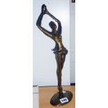 Contemporary bronze sculpture of a ballerina on points, indistinctly signed