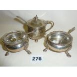 Pair of salts with matching spoons and a large silver mustard pot with blue glass liner and silver