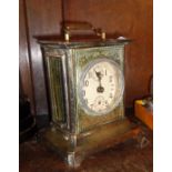 An old French metal mantel clock