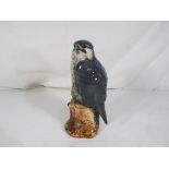 A Beswick Peregrine Falcon Beneagles blended scotch whisky decanter with contents sealed, 200 ml,