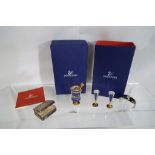 Swarovski - a champagne set comprising miniature bottle, bucket,