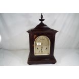 An early 20th century Westminster chiming table clock, dark stained mahogany case,