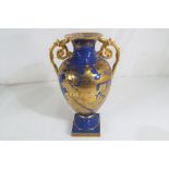 Spode - a gilt decorative Spode pottery vase on a blue ground,