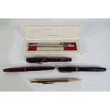Pens - A small collection of pens to include a Mabie Todd 'Swan' self filler with 14 ct nib,
