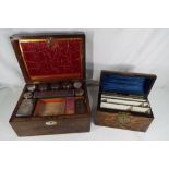 A travelling vanity set with plated bottle tops and a wooden correspondence box (2).